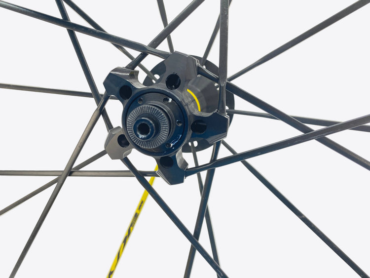 scratch on the left rear hub flange