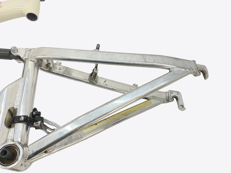left side of the swingarm