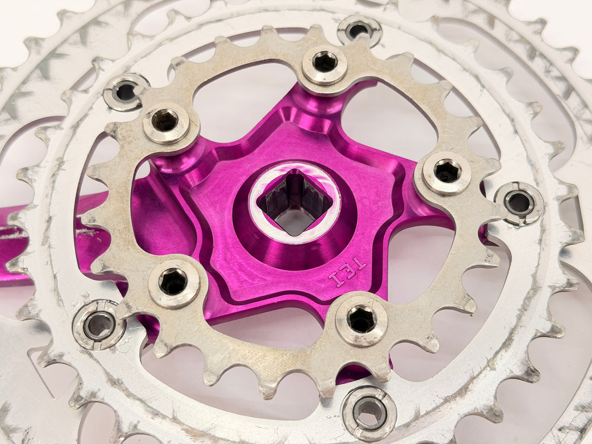 purple anodized crank close up back of chain rings