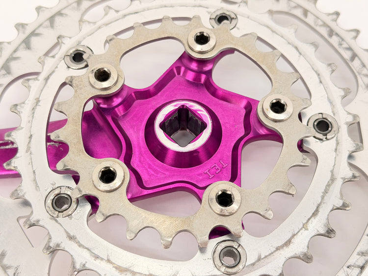 purple anodized crank close up back of chain rings