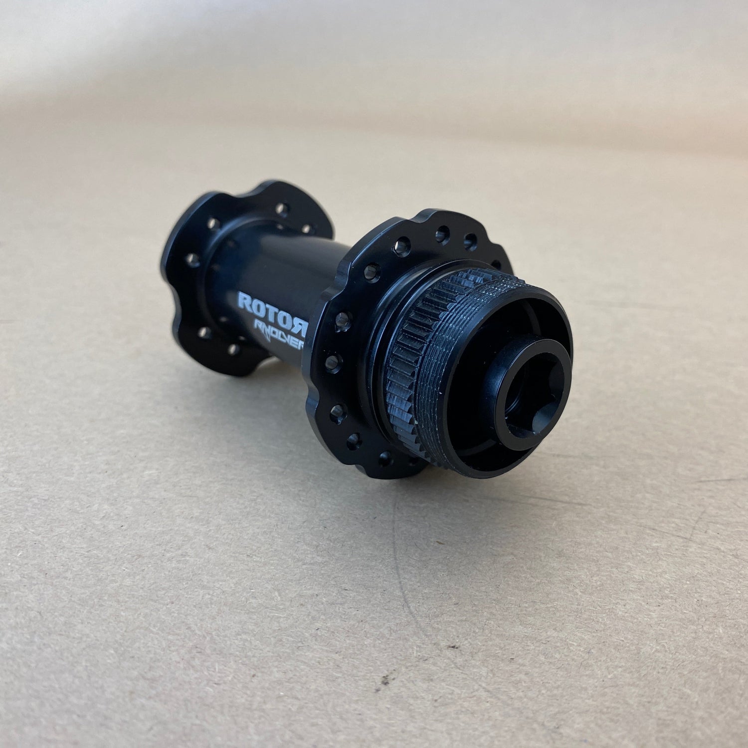 close up of the front rotor mount and axle end