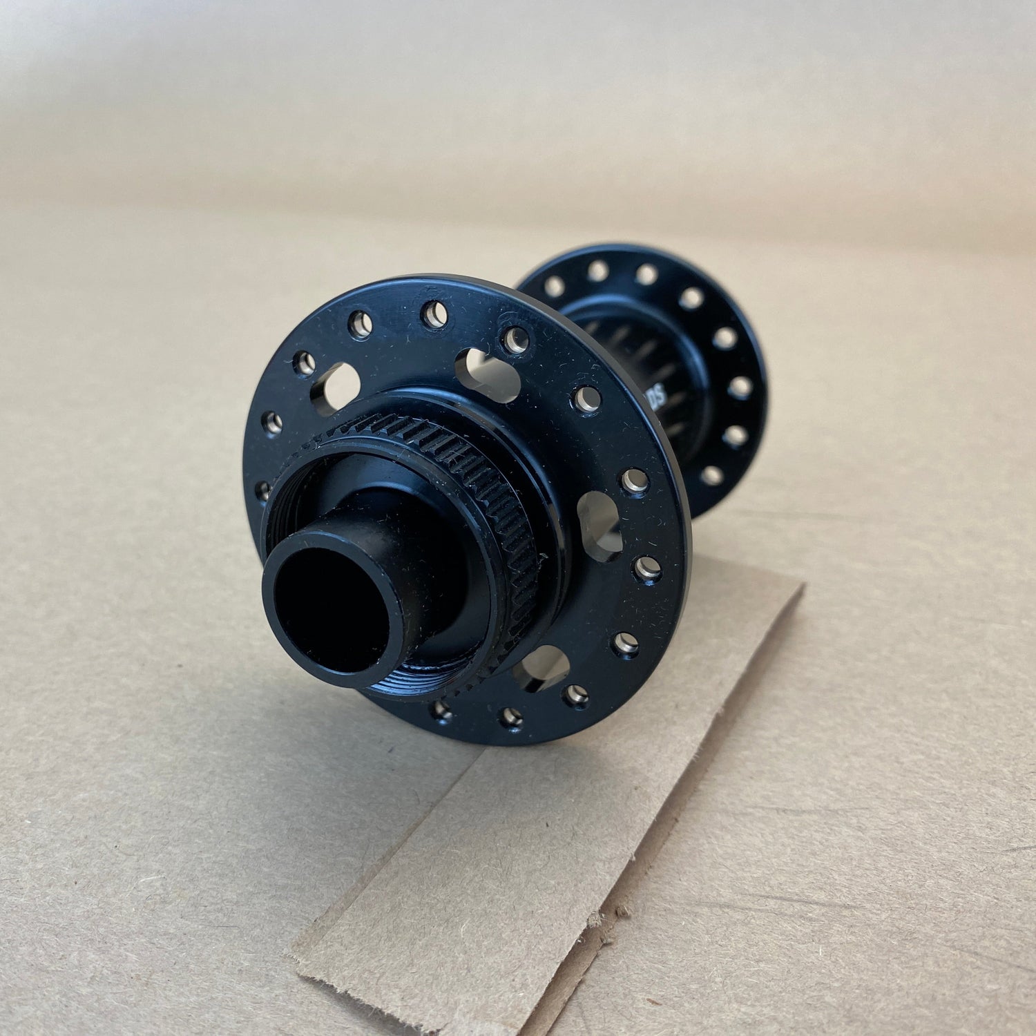 close up of the front rotor mount and axle end