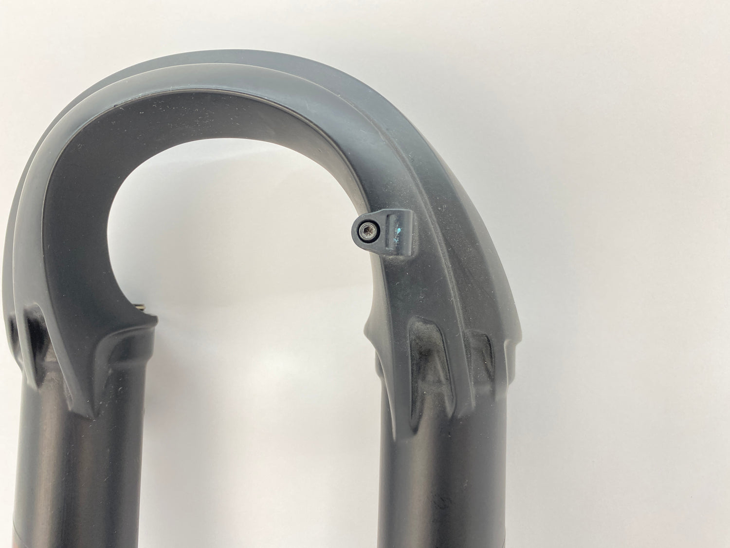close up of the brake line holder