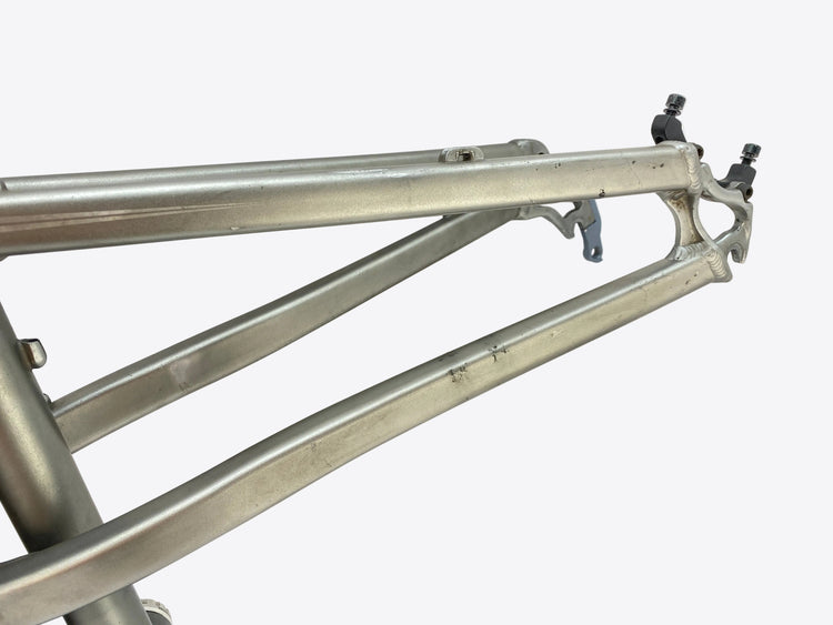 left side of the swingarm